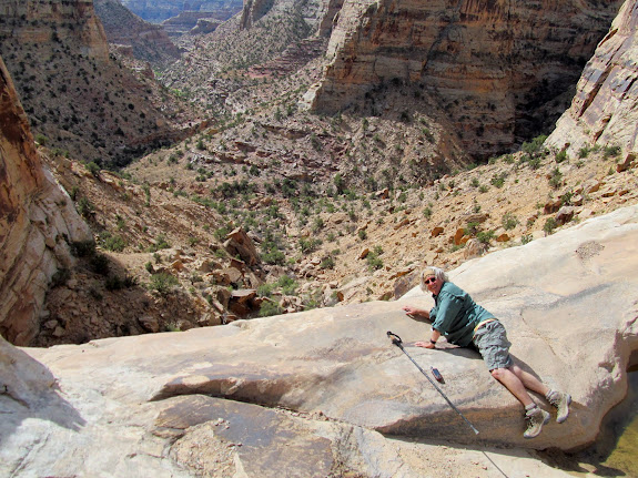 Ken crawling out to peer off the dryfall