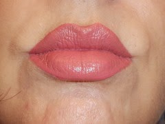 wearing Laura Mercier Paint Wash Liquid Lip Colour in Petal Pink