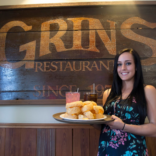 Grins Restaurant logo