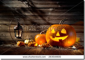 stock-photo-halloween-pumpkin-head-jack-lantern-on-wooden-background-283016600