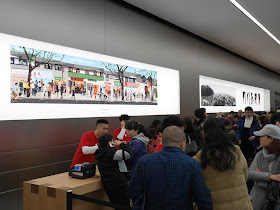 artwork on walls of Jiefangbei Apple Store on opening day