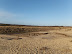 Damage to the dunes with this crater being eroded out