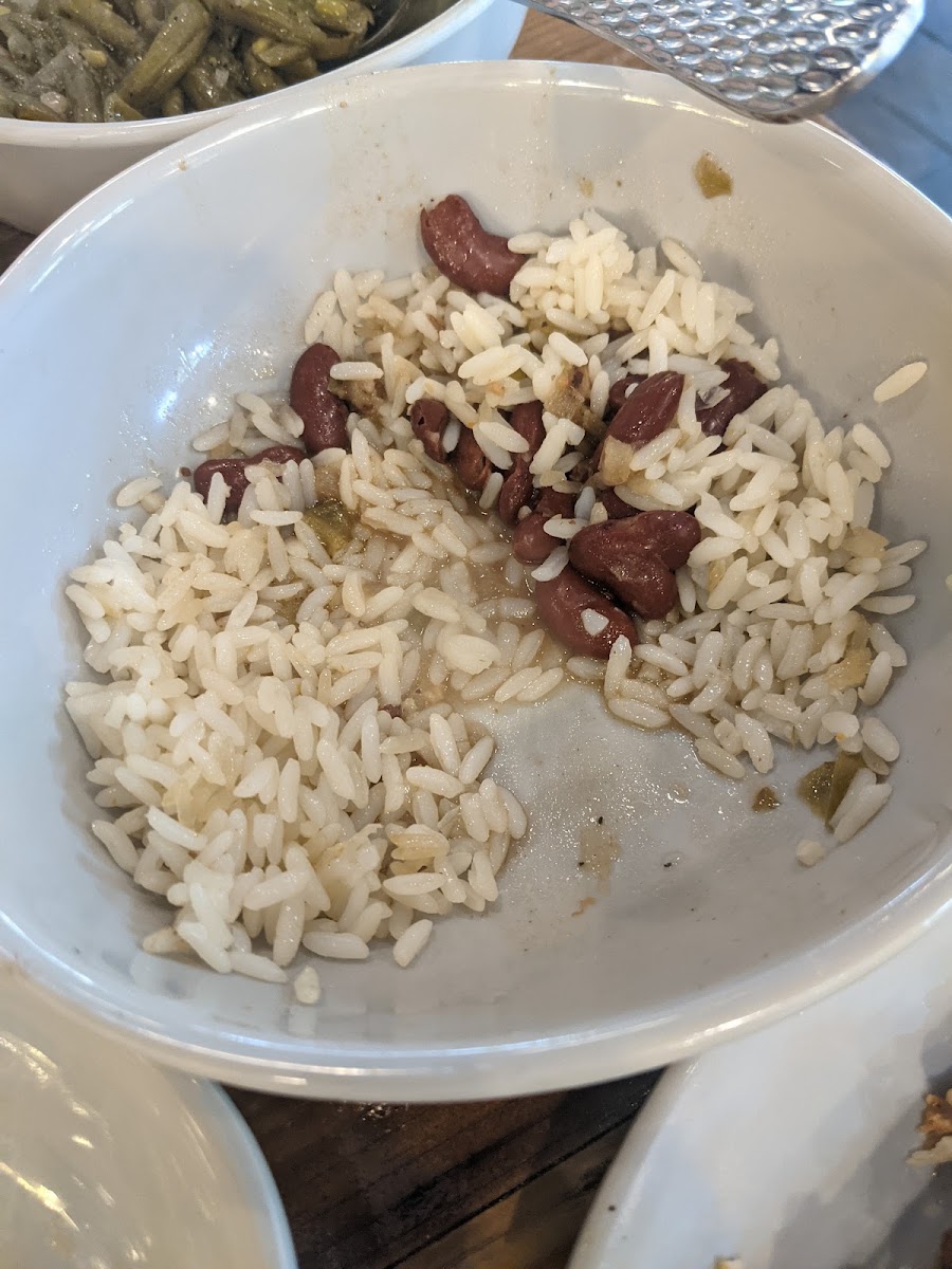 Major cross contamination. Green bean residue in the bottom of our rice and beans serving bowl. Gross