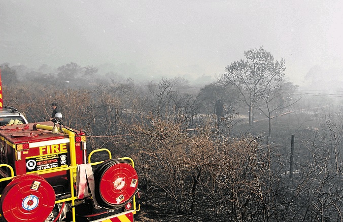 Fire fighters battle a blaze in Gonubie.