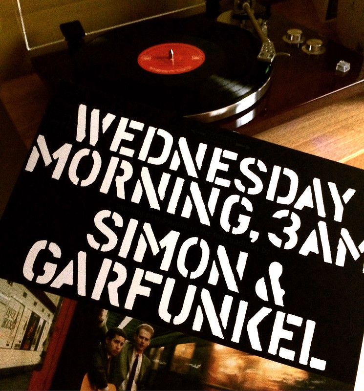 Simon and Garfunkels first album, `Wednesday Morning, 3am` shown in front of a record player.