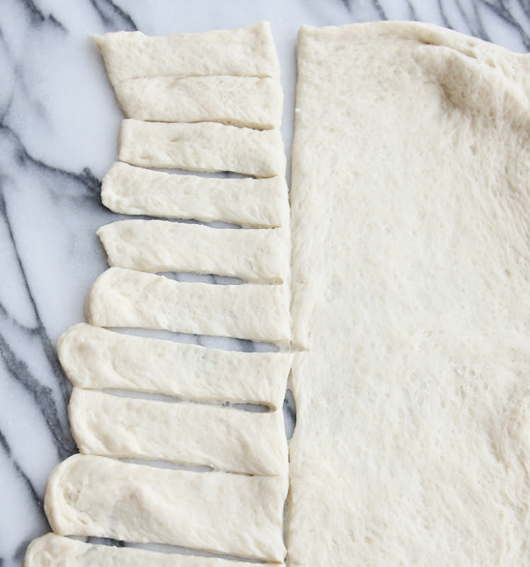 overhead photo of dough sliced into "fries"