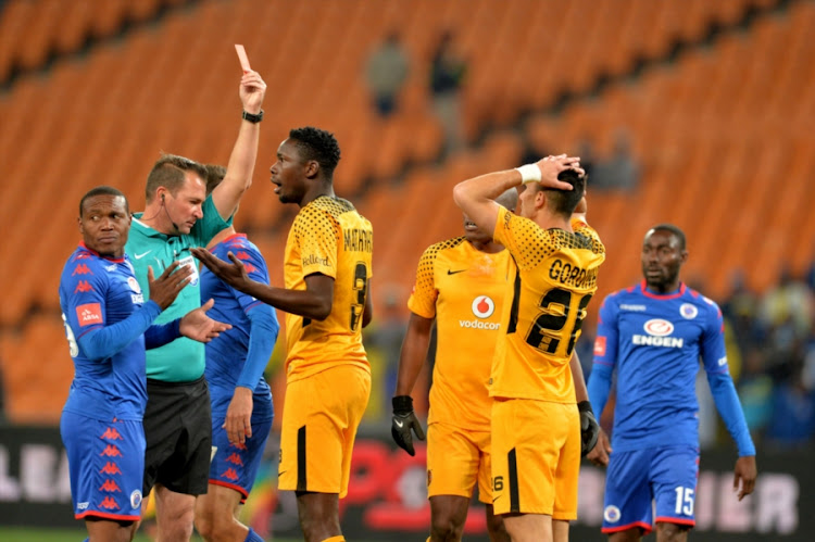 Referee Daniel Bennett gives Erick Mathoho a red card during the Absa Premiership match between Kaizer Chiefs and SuperSport United at FNB Stadium on August 23, 2017 in Johannesburg, South Africa.