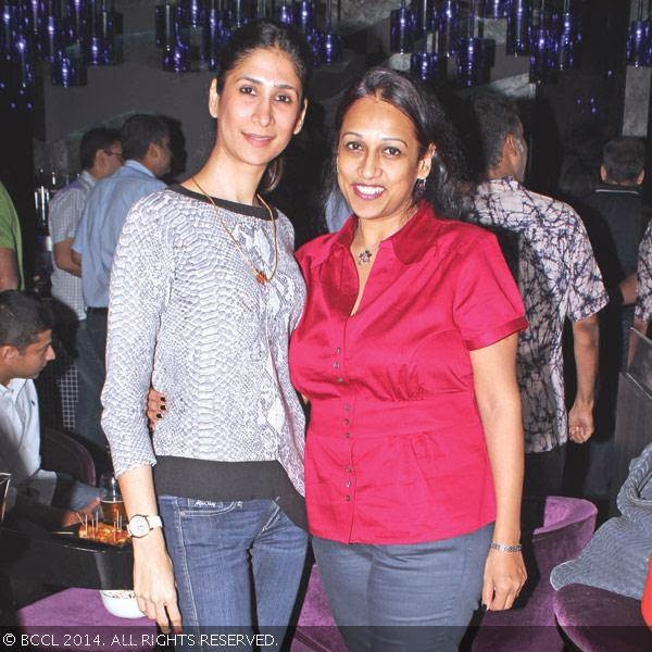 Indrani and Jharna get clicked during a stand-up comedy show by Radhika Vaz, held at Elevate Pub, T. Nagar in Chennai.