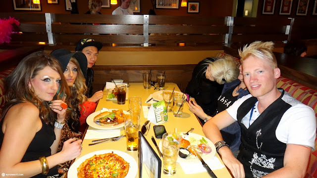 eats at boston pizza after the fashion show in Mississauga, Canada 