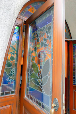 Ghibli Museum - Stained Glass on the front doors which pay homage to My Neighbor Totoro - they had stained glass with Ghibli characters in many places including the skylight ceiling in the Central Hall