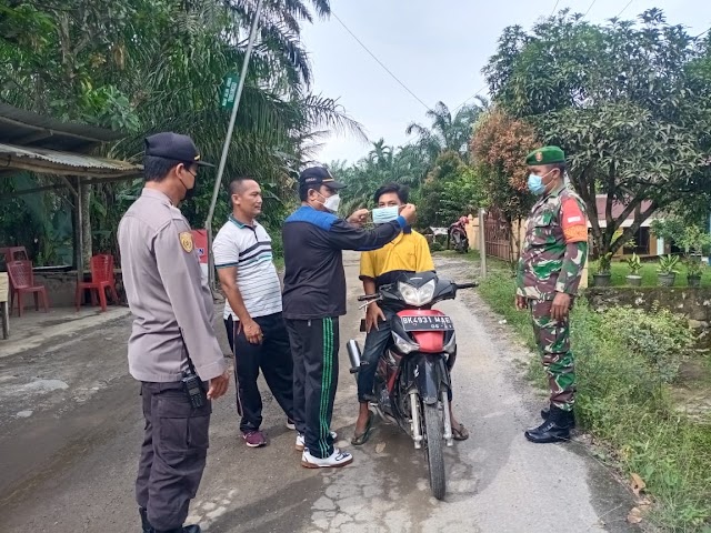 Cegah Penyebaran Covid-19, Polsek Kotarih Laksanakan Giat Penyekatan PPKM Level II