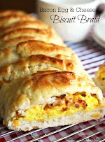 Bacon Egg And Cheese Biscuit Braid was pinched from <a href="http://www.melissassouthernstylekitchen.com/bacon-egg-and-cheese-biscuit-braid/" target="_blank">www.melissassouthernstylekitchen.com.</a>
