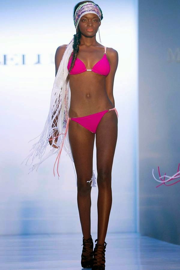 A model presents a creation of the Belusso collection during Mercedes-Benz Fashion Week Swim in Miami, July 20, 2014.