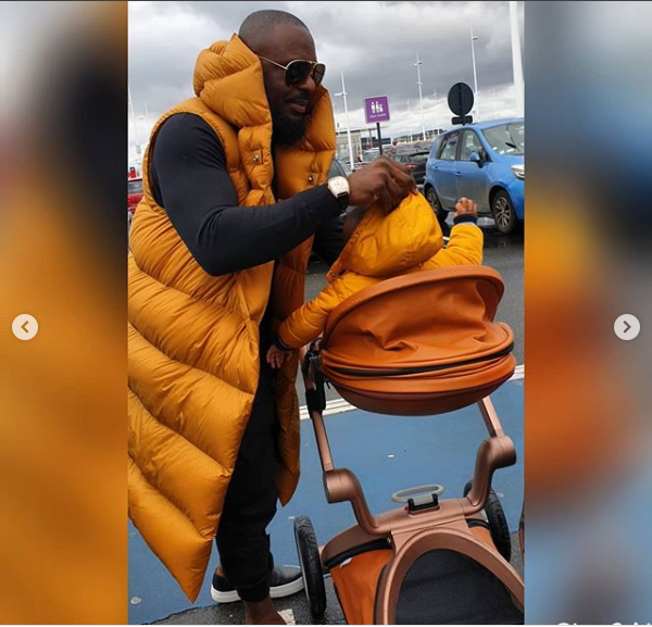 Daddy Duties: Actor Jim Iyke steps out with his son as they enjoy a stroll in Paris (Photos/Videos)