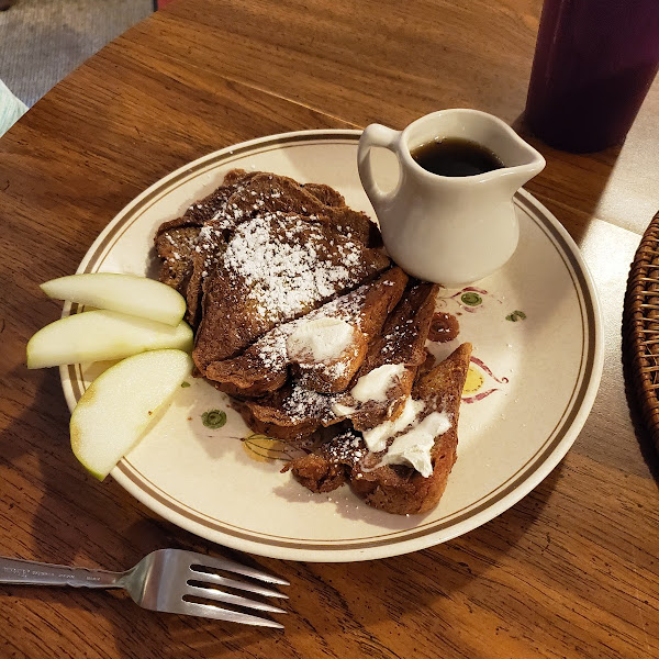 GF French toast, maple syrup,  and apple slices garnish