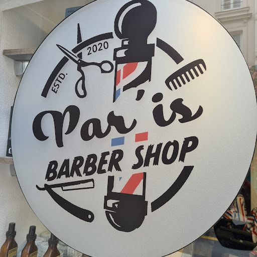 BARBER SHOP AND LADIES logo