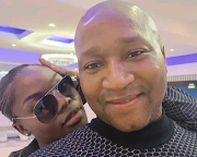 Mandla Lamba has been posting cosy pictures with the star on his timeline.