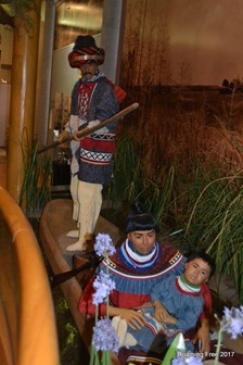 Family traveling by canoe