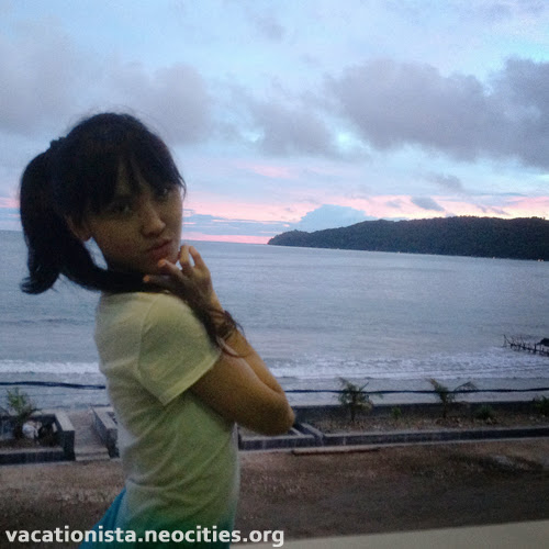 Cute Alexia pose on Hotel balcony in the afternoon three