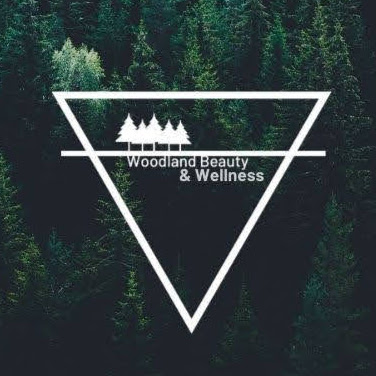 Woodland Beauty & Wellness logo