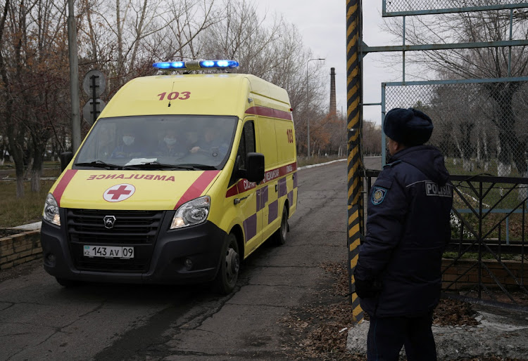 An ambulance drives out of the Kostenko coal mine operated by ArcelorMittal Temirtau as rescue operation continues following a mine fire, in Karaganda, Kazakhstan, October 28 2023. Picture: REUTERS
