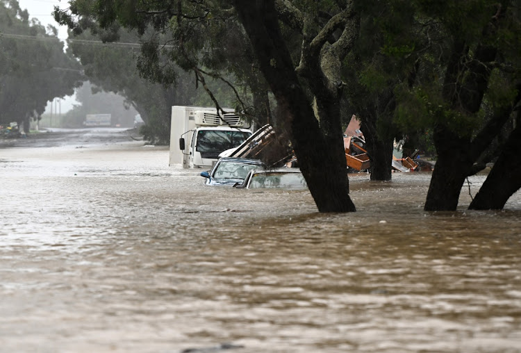 Floodwater inundate cars on March 30 2022 in Lismore, Australia. Picture: Dan Peled/Getty Images