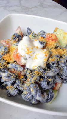 Marmo PDX's Strozapretti Pasta Salad with fresh squid ink pasta, cured salmon, dill crème fraîche, cucumber, capers, bread crumbs