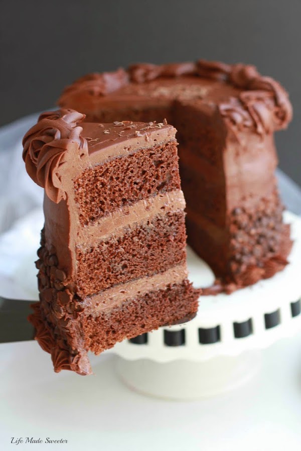 Ultimate Triple Chocolate Layer Cake - A triple layer chocolate cake with chocolate frosting & partially covered with mini chocolate chips..jpg