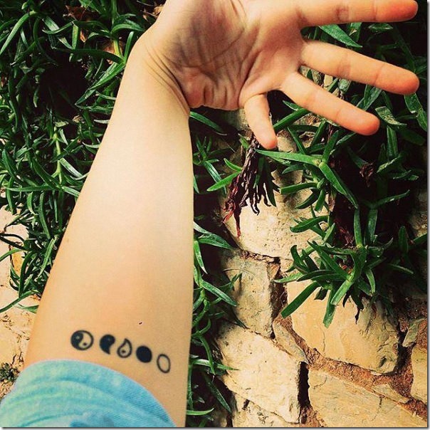 yin_y_yang_fragmentado_en_el_brazo yin_y_yang_fragmentado_en_el_brazo