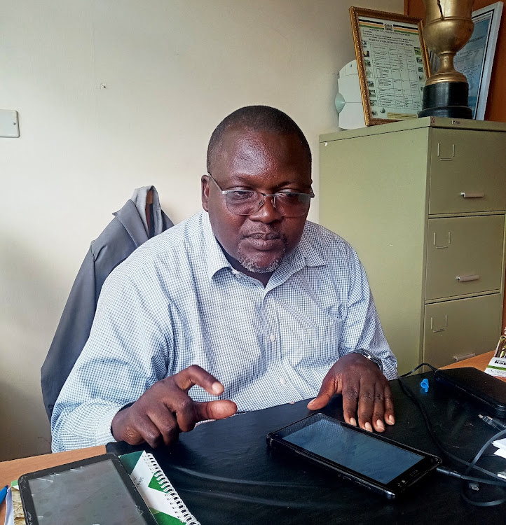 Kakamega county director of Livestock production Henry Odanga in his office