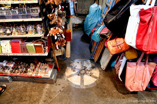 Secret wheel of Mercato Nuovo Florence. From More Secrets of Florence: Naked Debtors And Michelangelo's Graffiti