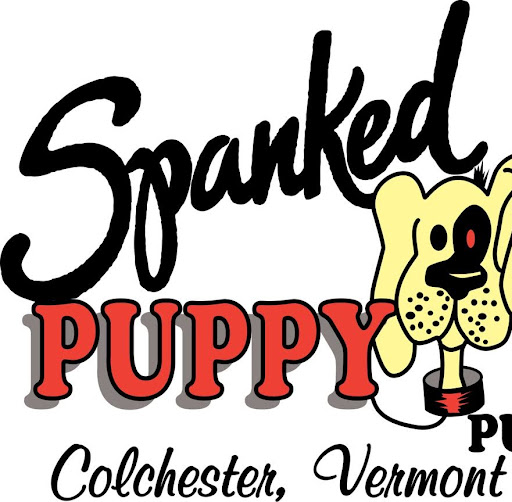 The Spanked Puppy Restaurant & Pub logo