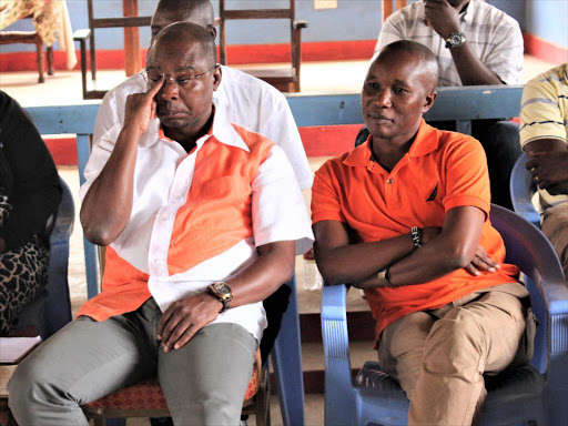 Kilifi governor Amason Kingi (left) with Ganze MP Teddy Mwambire during a meeting with church leaders at Tsangalaweni in Ganze. /FILE