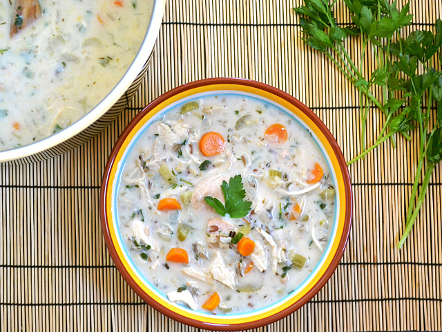 Top view of a bowl of creamy chicken & rice soup