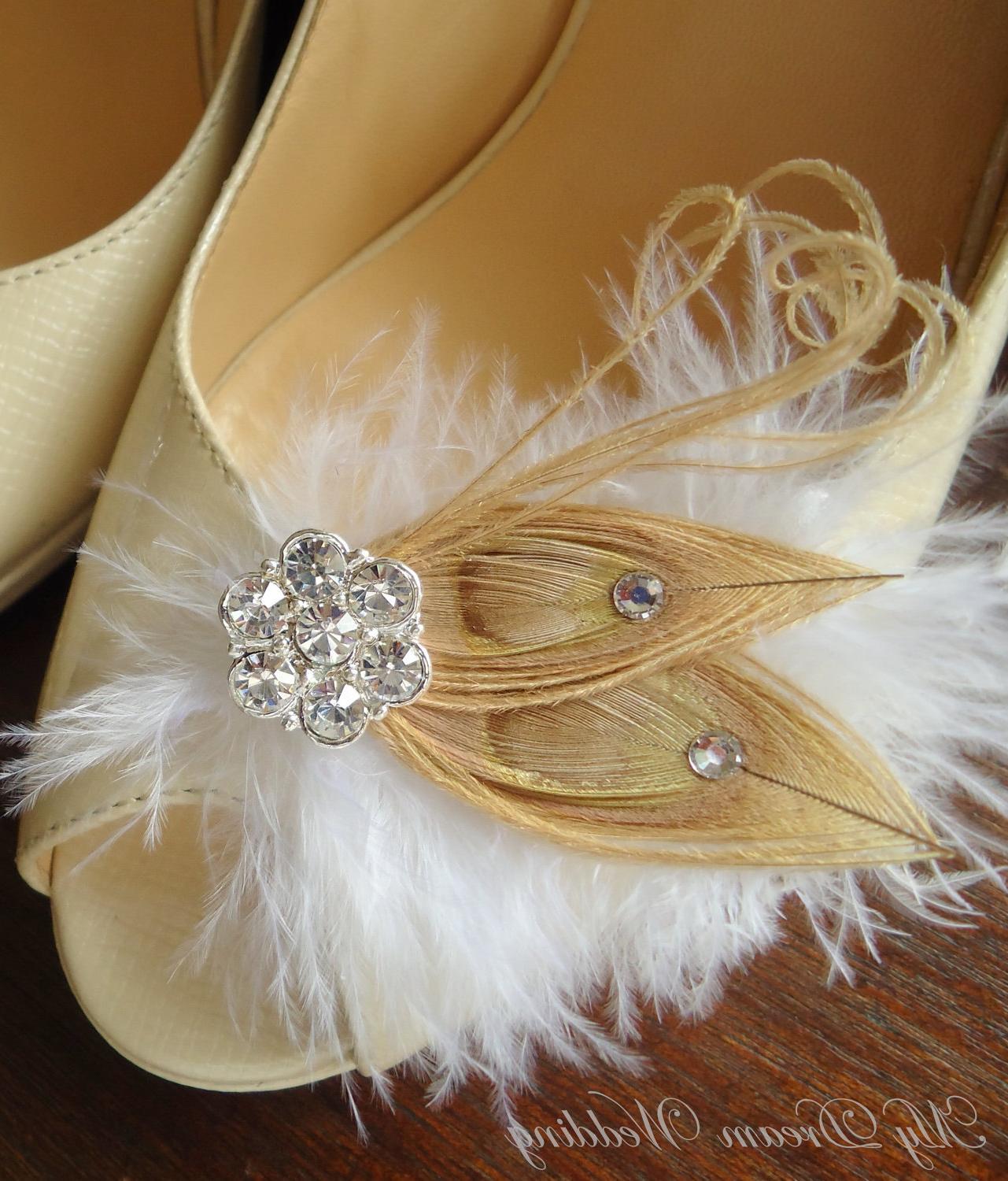 Beige Peacock shoe clips.