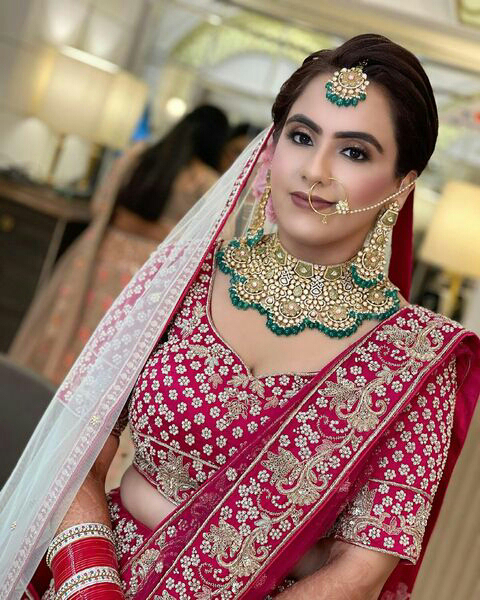 Punjabi girl's traditional wedding reception make-up - Village Barber ...