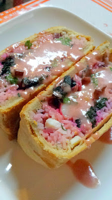 Kachka PDX, a traditional dish called kulebyaka of multi-layered pie filled with black cod, red chard and crepes, served with creme eurette