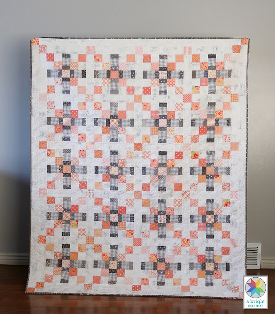 Scrappy gray and coral quilt by Andy Knowlton of A Bright Corner - pattern is from the book Season to Taste