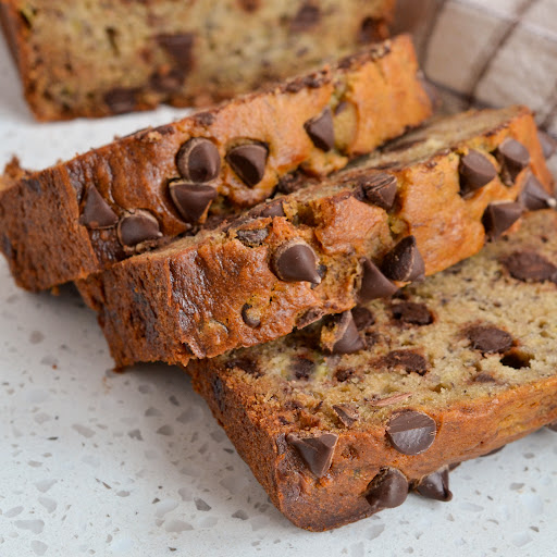 A moist decadent Chocolate Chip Banana Bread made quick and easy with simple ingredients. Don’t throw away those over-ripe bananas.