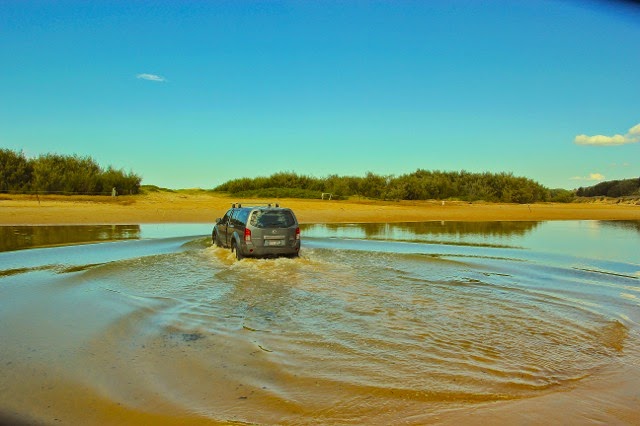 driving the beach in Red Rock, Australia