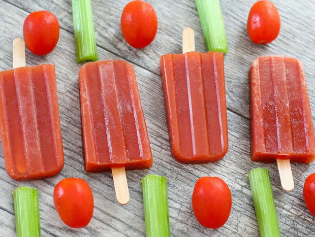 top-down shot of four bloody mary ice pops