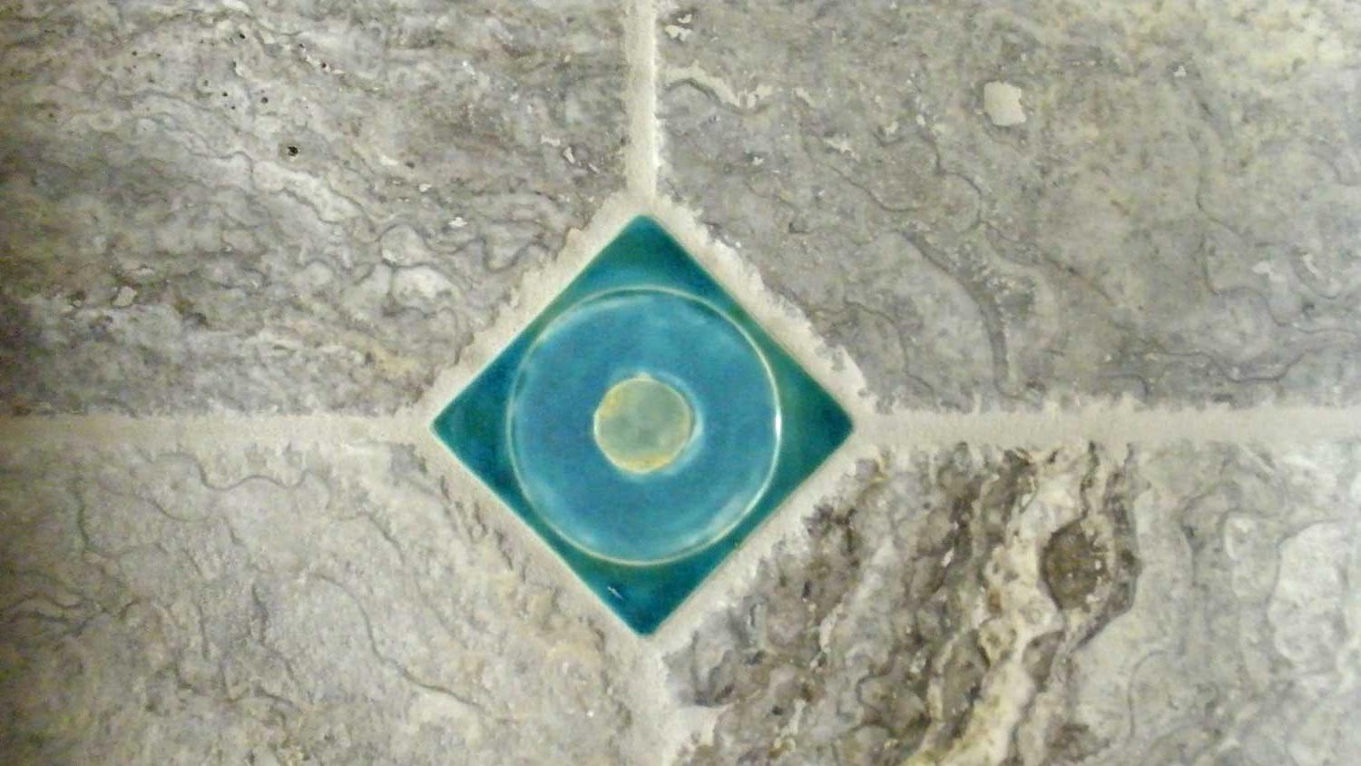 turquoise tile in travertine