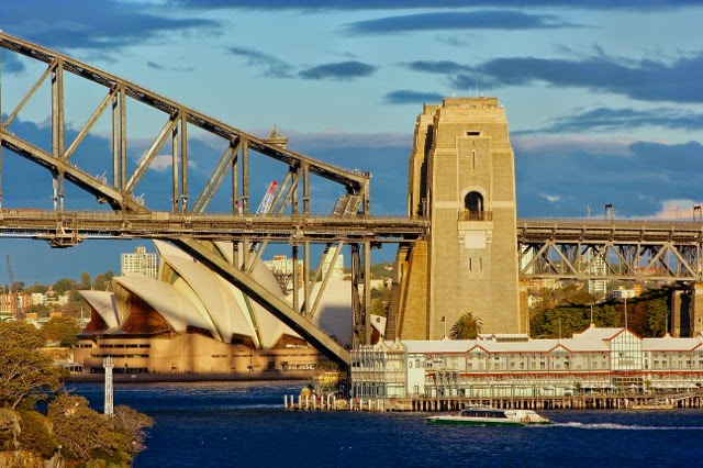 The old Finger Wharves, now theatres and shops, and beyond, the Opera House.