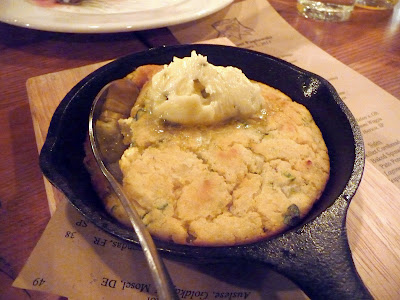 Tasty and Alder's buttery skillet corn cake side at dinner