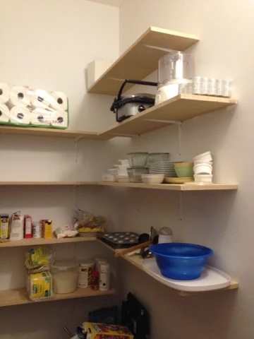 opposite wall shelving in pantry