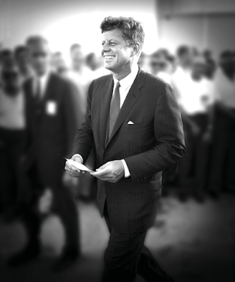 President Kennedy walking in suit at Cape Canaveral