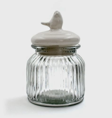  Wide glass jar with white ceramic lid topped with a bird. (Foodsafe).