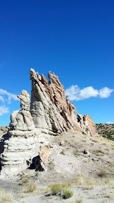 The formations here in Plaza Blanca in Abiquiu were an inspiration for paintings by Georgia O'Keeffe. It was first in From the White Place, 1940, oil on canvas, that she showcased the amazing forms of this area.