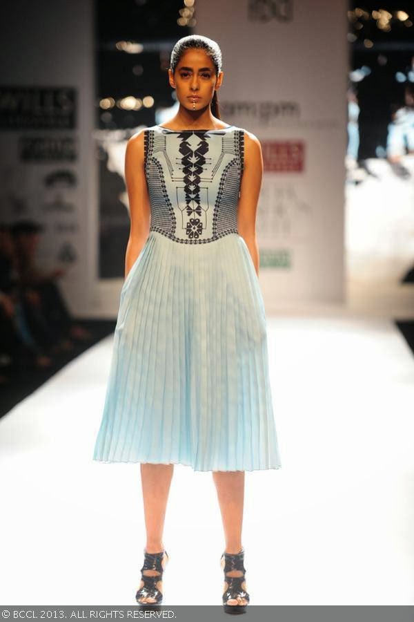 Diva showcases a creation by fashion designers Ankur Modi and Priyanka Modi on Day 2 of Wills Lifestyle India Fashion Week (WIFW) Spring/Summer 2014, held in Delhi.