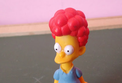 Miniatura de vinil boneco estático de Rod Flanders do desenho Simpsons 7,5cm de altura  R$ 10,00